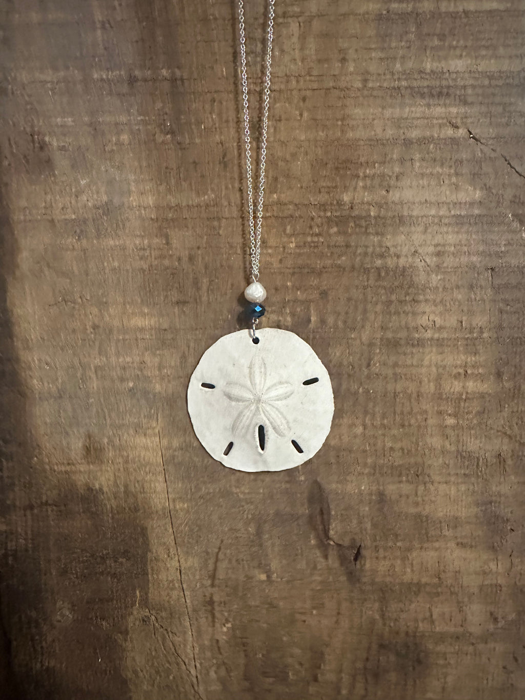 Ocean breeze sand dollar pendant necklace
